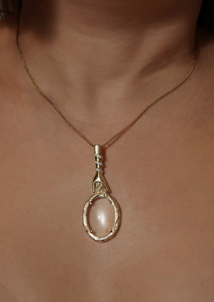 Care Magnifying Glass Pendant