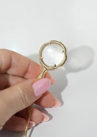 Stepping Stone Magnifying Glass Pendant