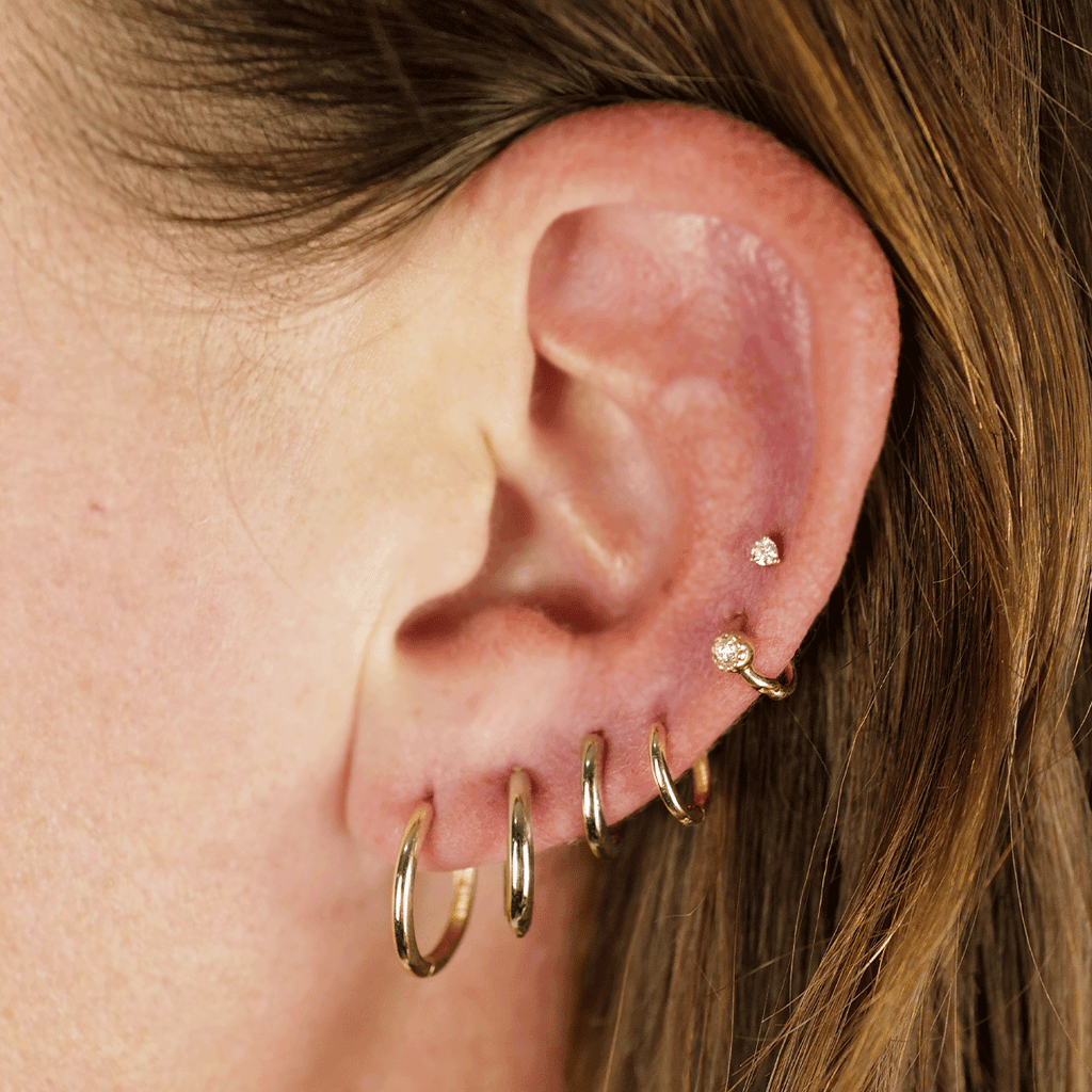 Second stud top earrings in gold