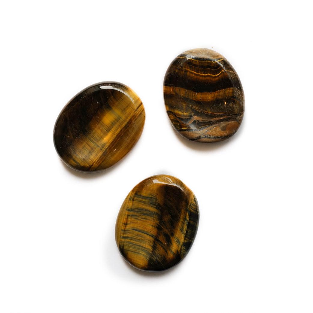 547 Palm stone or worry stone outlet in this high grade tigereye is usually seen in jewelry. Tigereye helps ease tension adds to mental acuity.